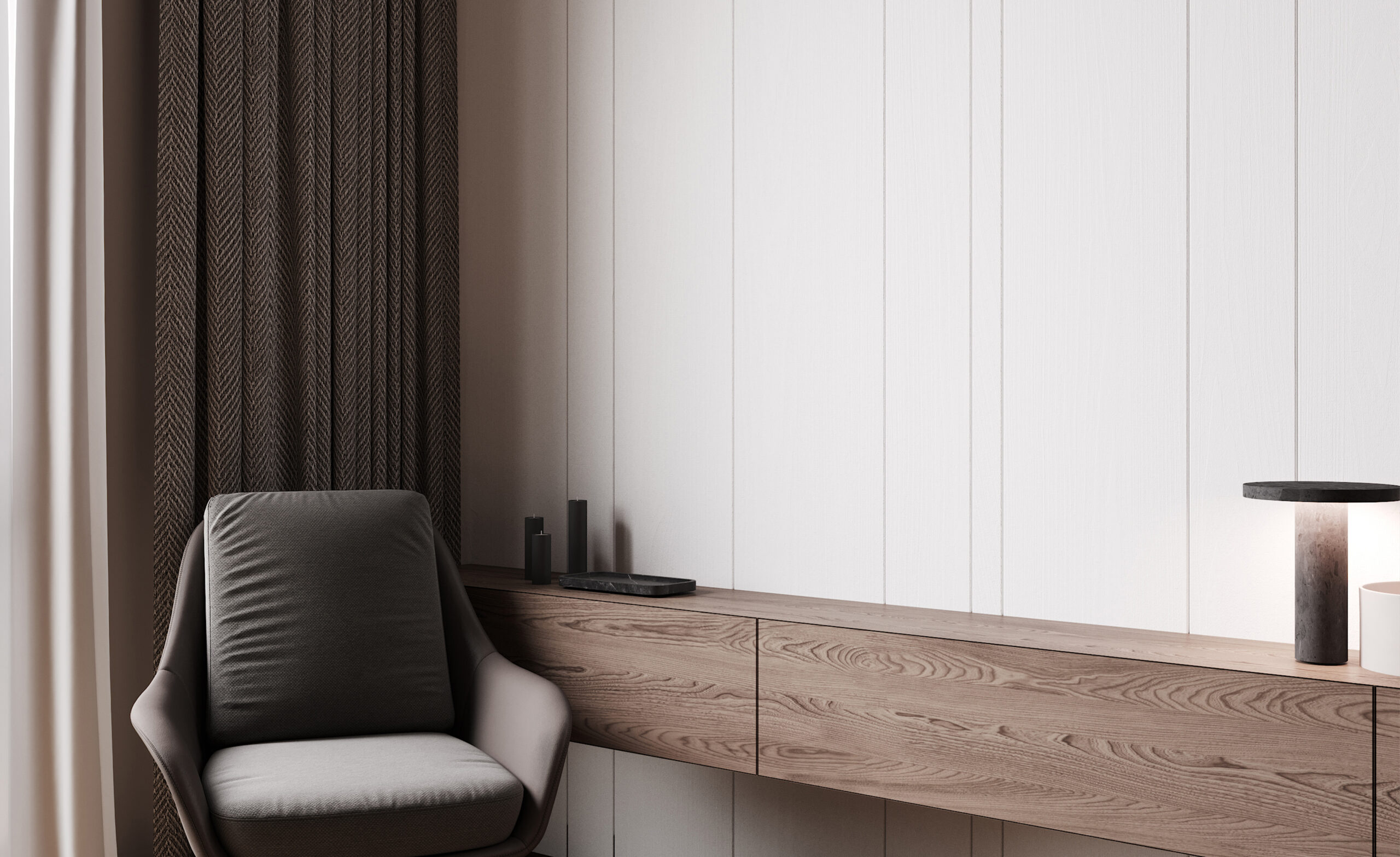 Stijlvolle wandafwerking door JRC Afbouw met ingebouwde houten console en comfortabele fauteuil, perfect voor een modern en warm interieur.